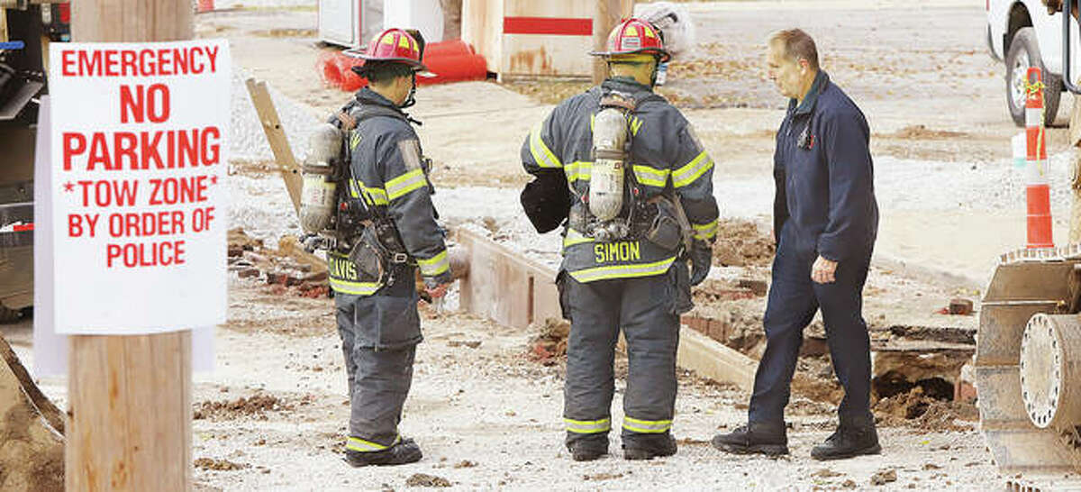 Alton firefighters stood by Wednesday for about half an hour while workers from the Gas Division of Ameren crimped off a gas line that was struck by construction workers in the 100 block of East 5th Street in Alton. Firefighters received the call about 1 p.m. Wednesday after the line in the street was severed in a trench near the Salvation Army. The construction work is part of the large sanitary sewer replacement project by Iliinois American Water Company. That work has had Alby Street closed for weeks. No injuries were reported.