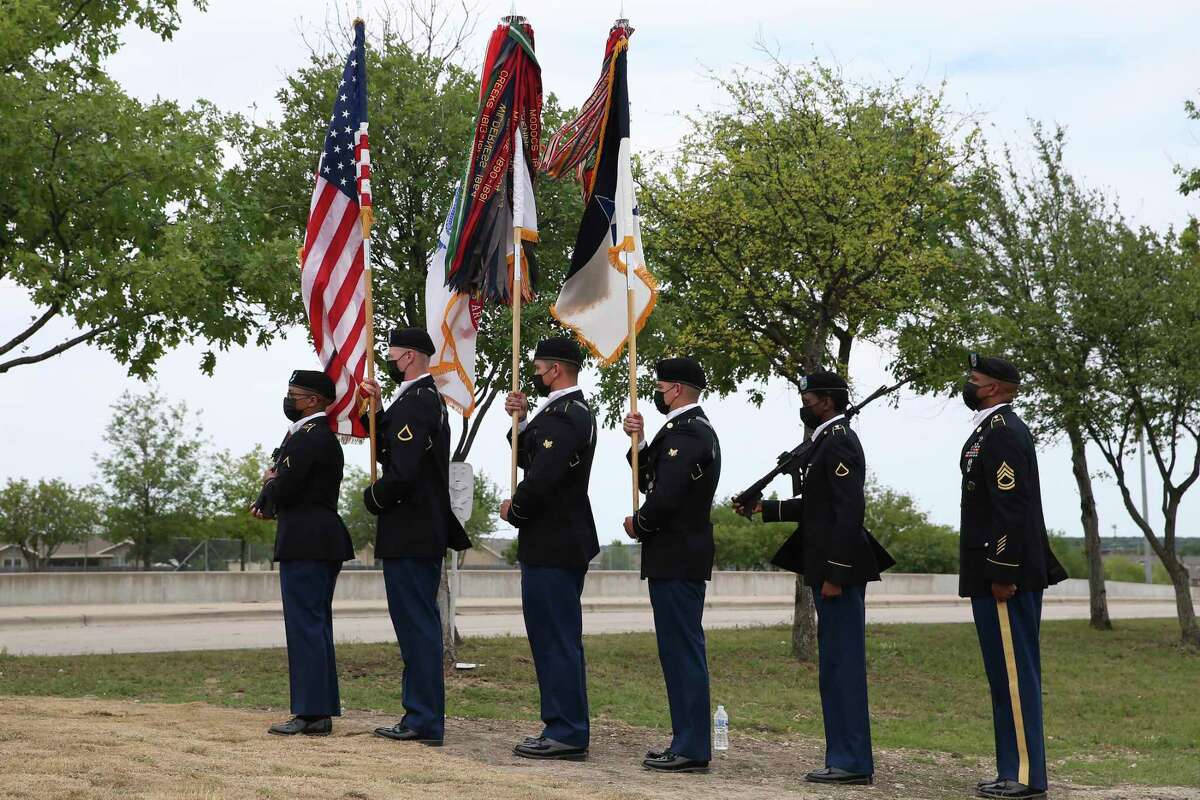 The Fort Hood Honor Guard prepares to post the colors in April at the dedication of a gate in honor of Pfc. Vanessa Guillen, who was killed at the base in 2020. Her death has sparked a national outrage, congressional hearings and legislation that aims to stop sexual harassment and assault in the military.
