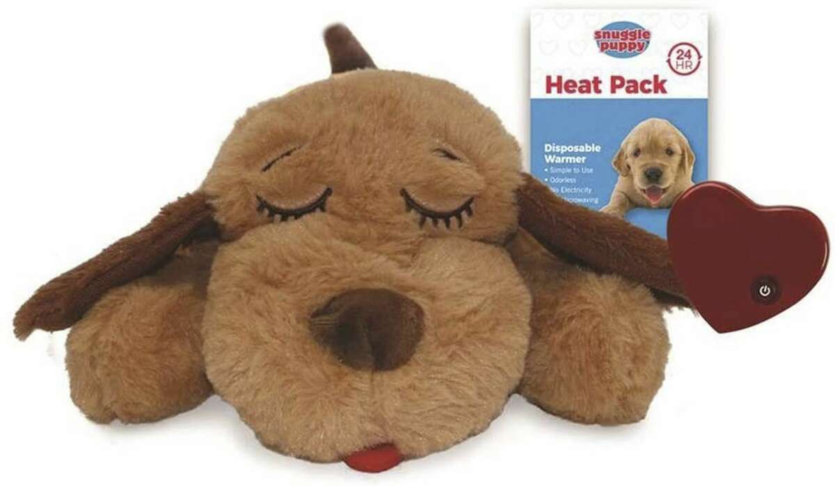 The Snuggle Puppy has a battery-powered heartbeat and can be warmed with a heat pack to provide comfort to anxious pets.