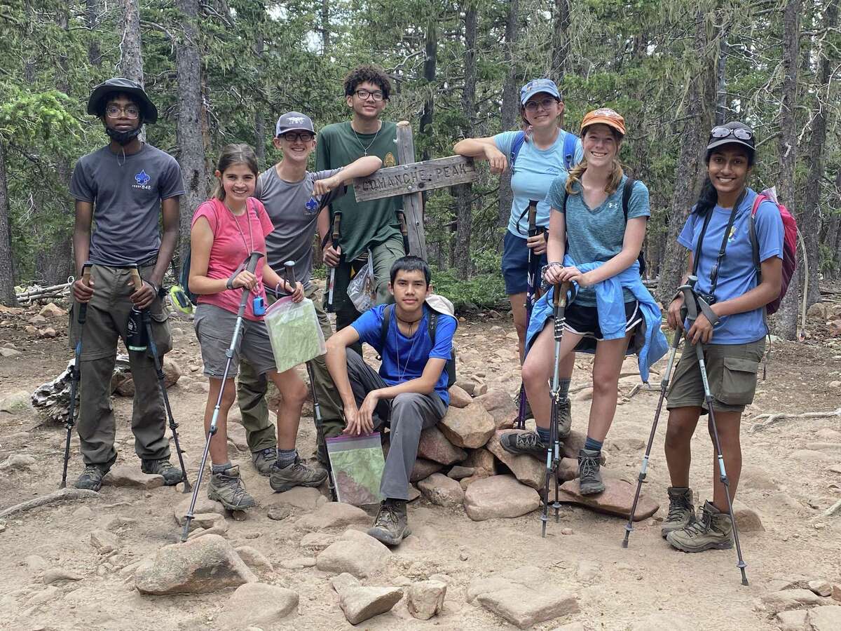 Members of BSA troops 849 and 848 pause during a hike at Philmont Scout Ranch in Cimarron, New Mexico.