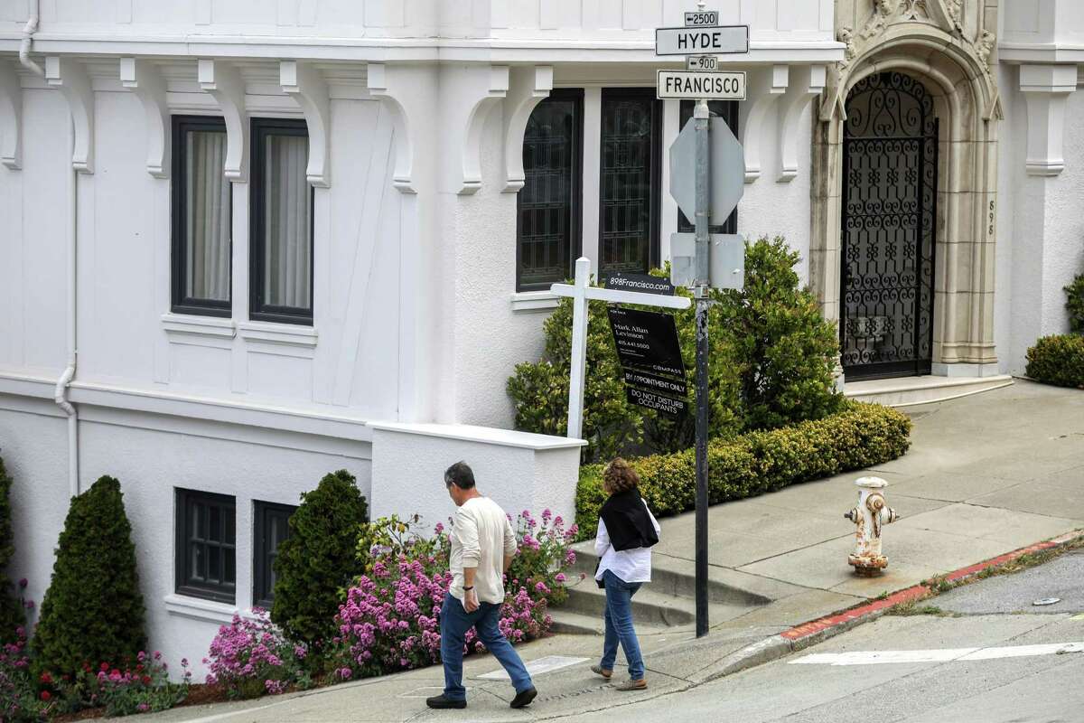 A home on the corner of Hyde and Francisco streets in the Russian Hill neighborhood of San Francisco, Calif., was for sale on Wednesday, June 23, 2021. According to a report released Nov. 10, 2021, it takes a household income of around $331,600 to qualify for a house in San Francisco.