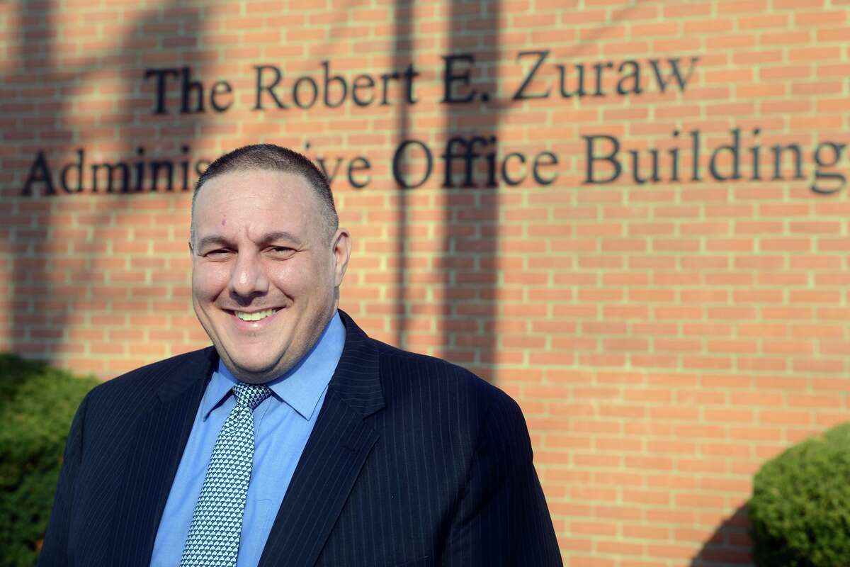Supt. Joe DiBacco poses in front of the Board of Education office in Ansonia, Conn. Nov. 10, 2021.