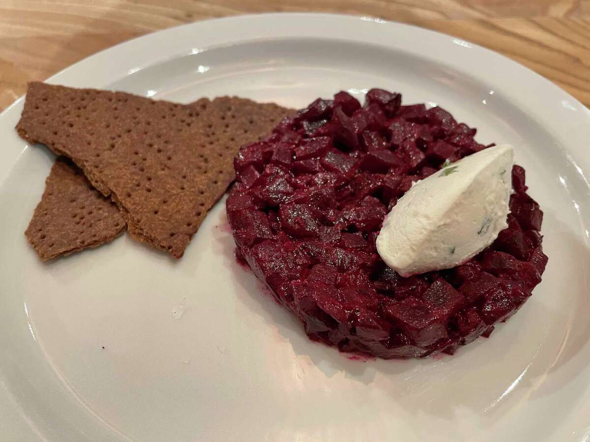 Beet tartare topped with Modern Kitchen cream cheese, plus crackers from Netzro, served at Larissa Zimberoff's futuristic dinner at 18 Reasons in San Francisco.