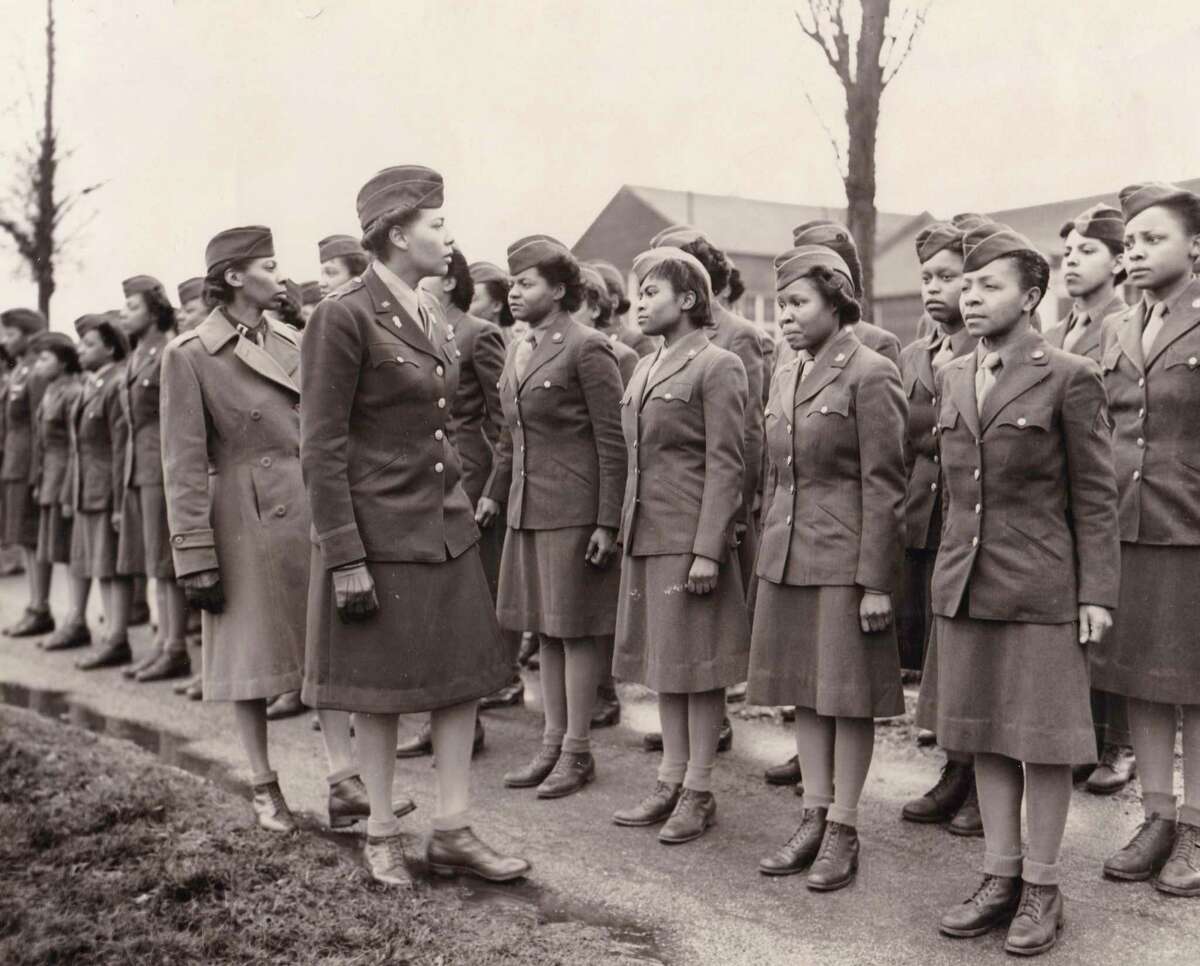 FILE - In this photo provided by the U.S. Army Women's Museum, members of the 6888th battalion stand in formation in Birmingham, England, in 1945. The Women's Army Corps battalion made history as the only all-female Black unit to serve in Europe during World War II. For Veterans Day, a group of Democratic lawmakers is reviving an effort to pay the families of Black servicemen who fought on behalf of the nation during World War II for benefits they were denied or prevented from taking full advantage of when they returned home from war. (U.S. Army Women's Museum via AP, File)