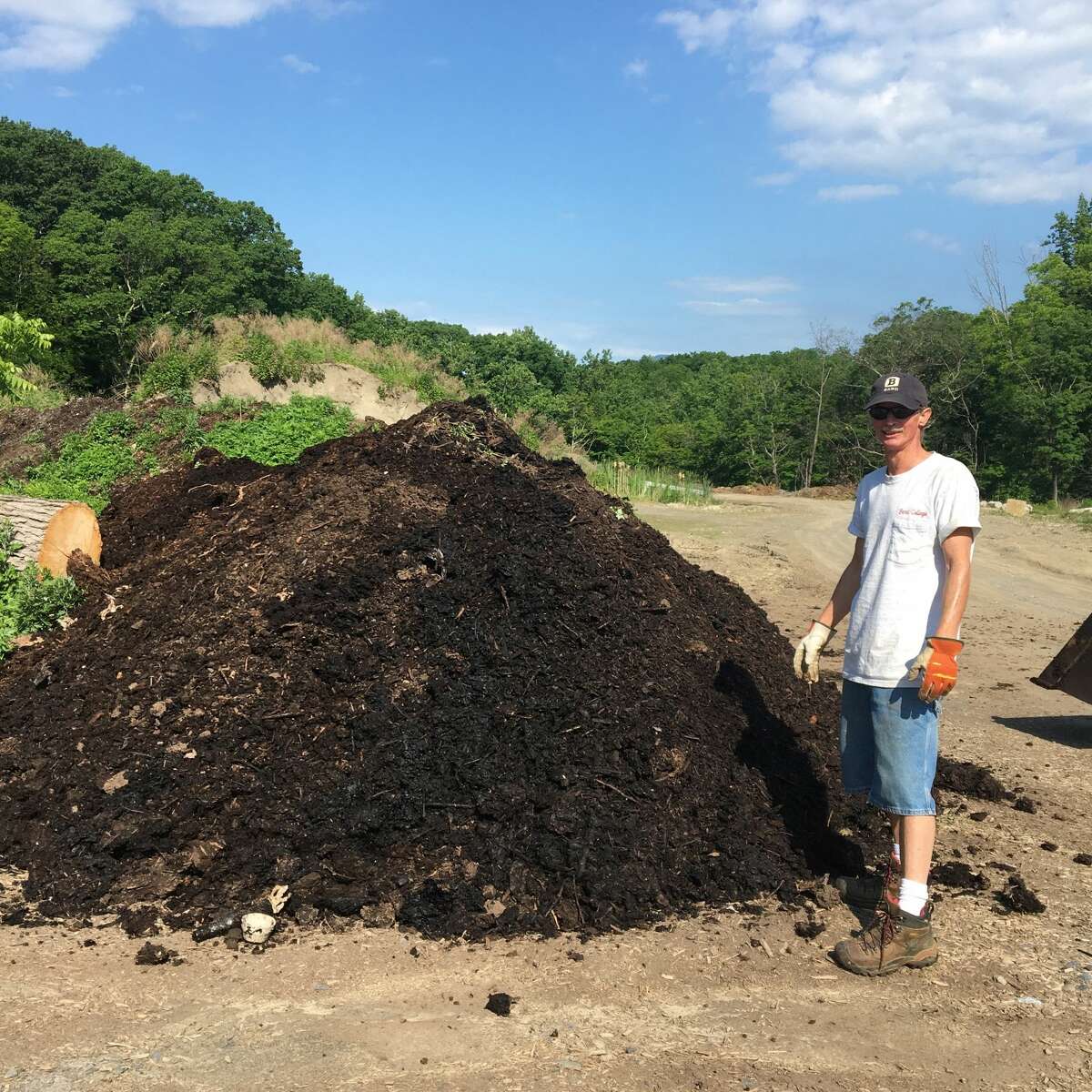 Fred Schultz, Environmental Field Manager at Bard College, at the on-site composting pile. 
