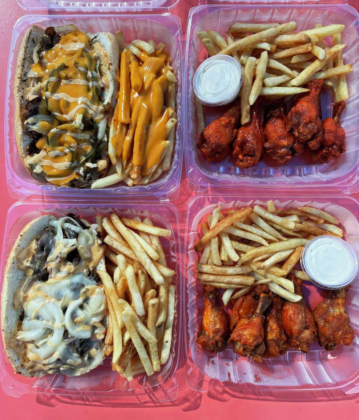The menu is simple at G&J Treats with (clockwise from top left): Texas cheesesteak, hot Buffalo wings, mild Buffalo wings and a traditional Philly sandwich.