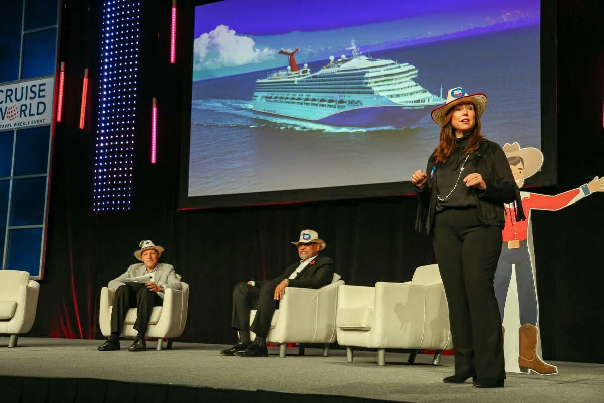 Carnival Cruise Line President Christine Duffy sports a cowboy hat as she reveals plans for the Carnival Jubilee at the CruiseWorld travel advisor conference in Miami Beach, Fla. on Thursday, Nov. 11, 2021.