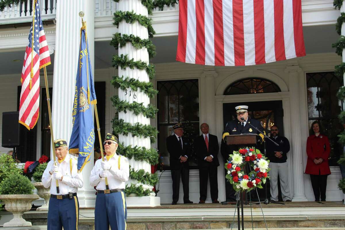 Ridgefield Fire Chief Jerry Myers, at lectern, served in the U.S. Army for three years before joining the Ridgefield Fire Department. Thursday, Nov. 11, 2021.