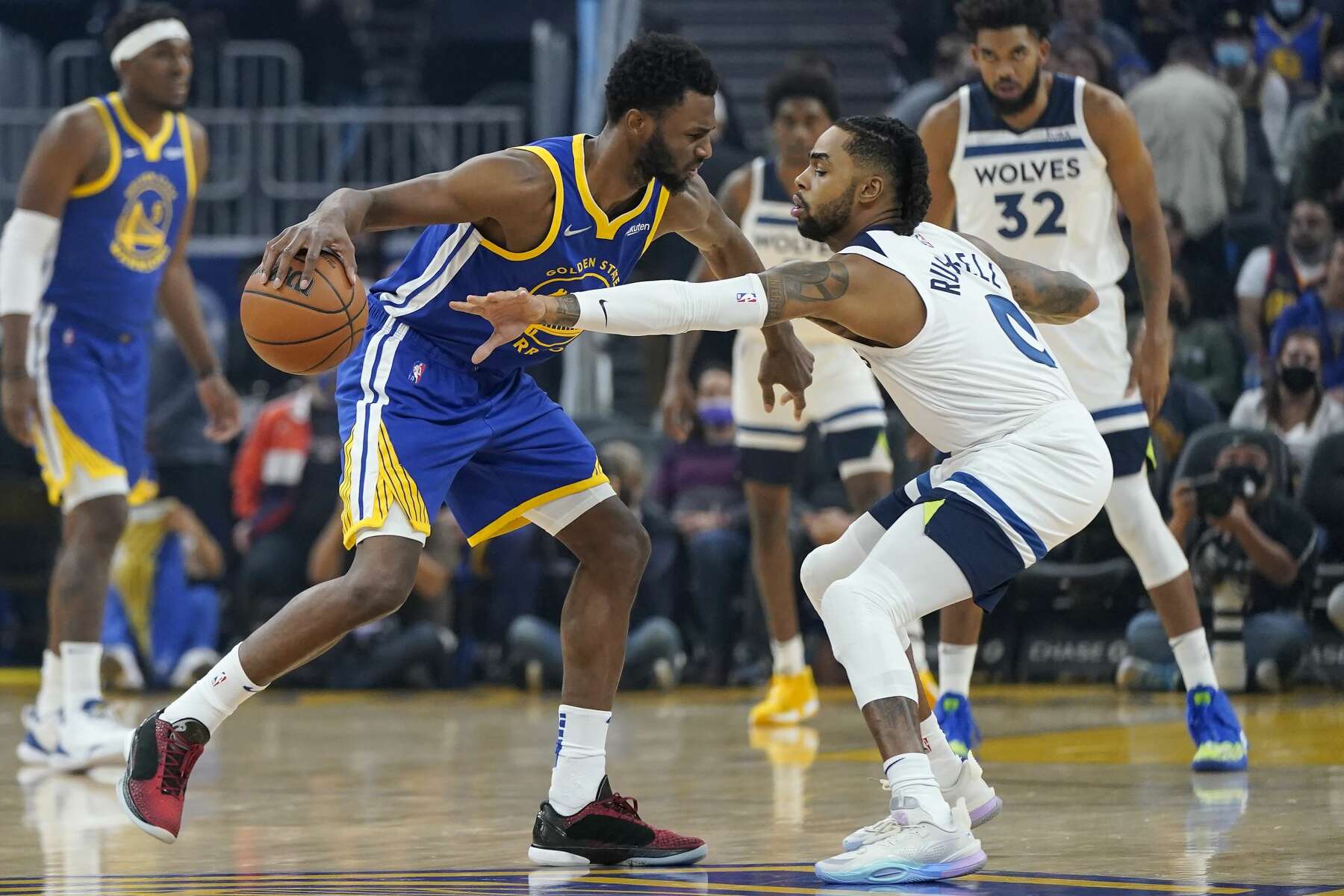 Warriors trade D'Angelo Russell to Timberwolves for Andrew Wiggins, picks