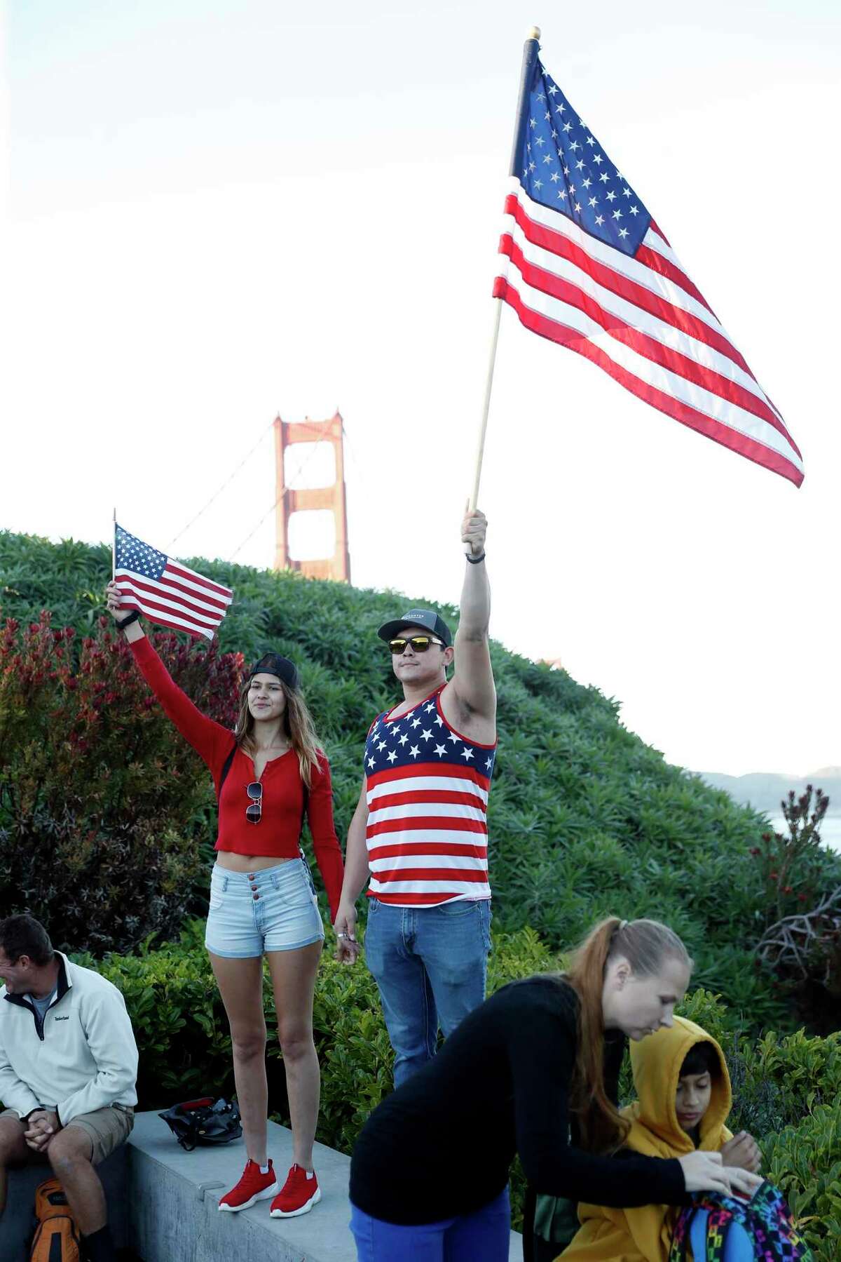 Madison and Anthony join in as anti-vaxxers gather at the Golden Gate Bridge to protest mandates in San Francisco, Calif., on Thursday, November 11, 2021.