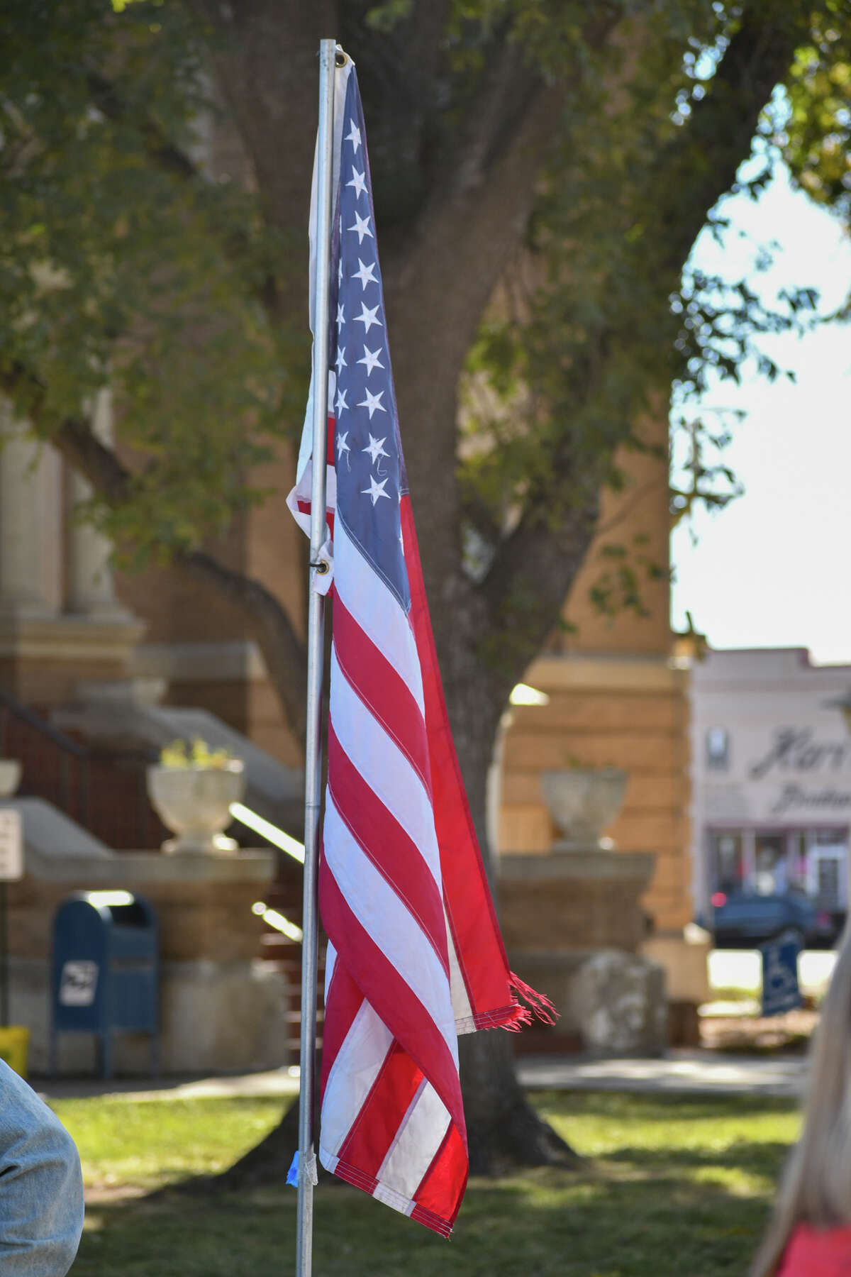 About two dozen citizens gathered for a Veteran’s Day ceremony at the veteran’s memorial in front of the Hale County Courthouse on Thursday morning. 