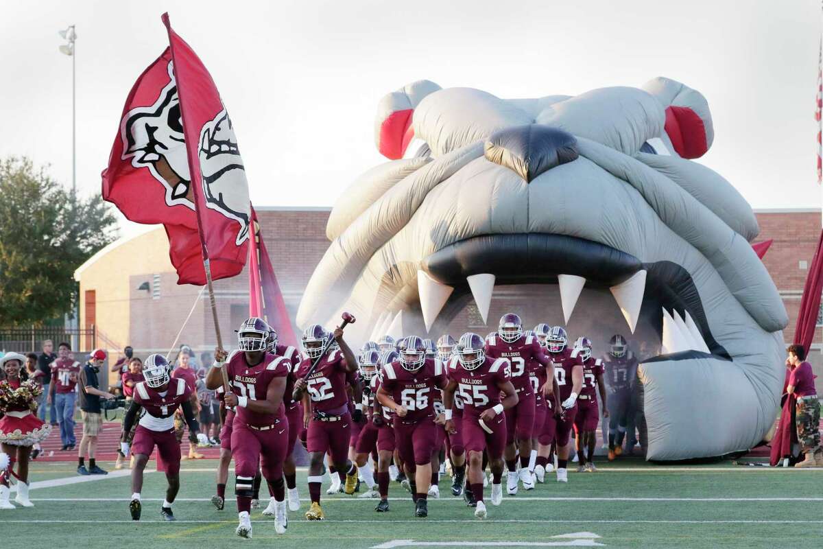 Summer Creek players take the field before the first half of their non-district high school football game against Conroe at George Turner Stadium Friday, Sept. 10, 2021 in Humble, TX.
