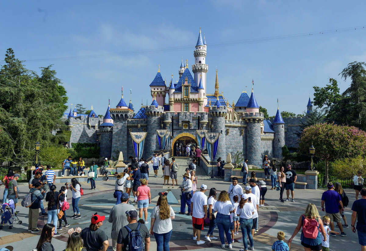Visitors to Disneyland in front of Sleeping Beauty Castle inside Disneyland in Anaheim, Calif., on Friday, Sept. 3, 2021.