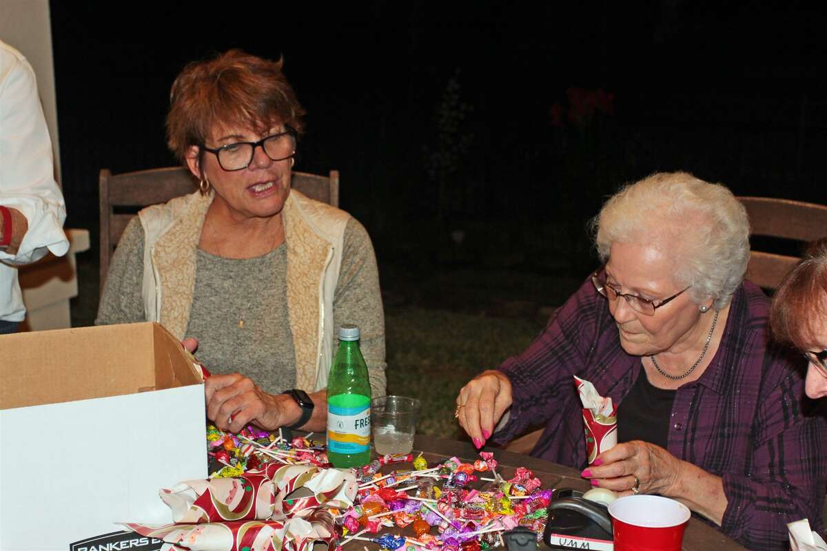 Rotary Club of Lake Conroe club members gathered at the home of Rotarian Mike Berger to complete their annual Candy Roll Project where they send hard candy to some of the poorest areas of Mexico.