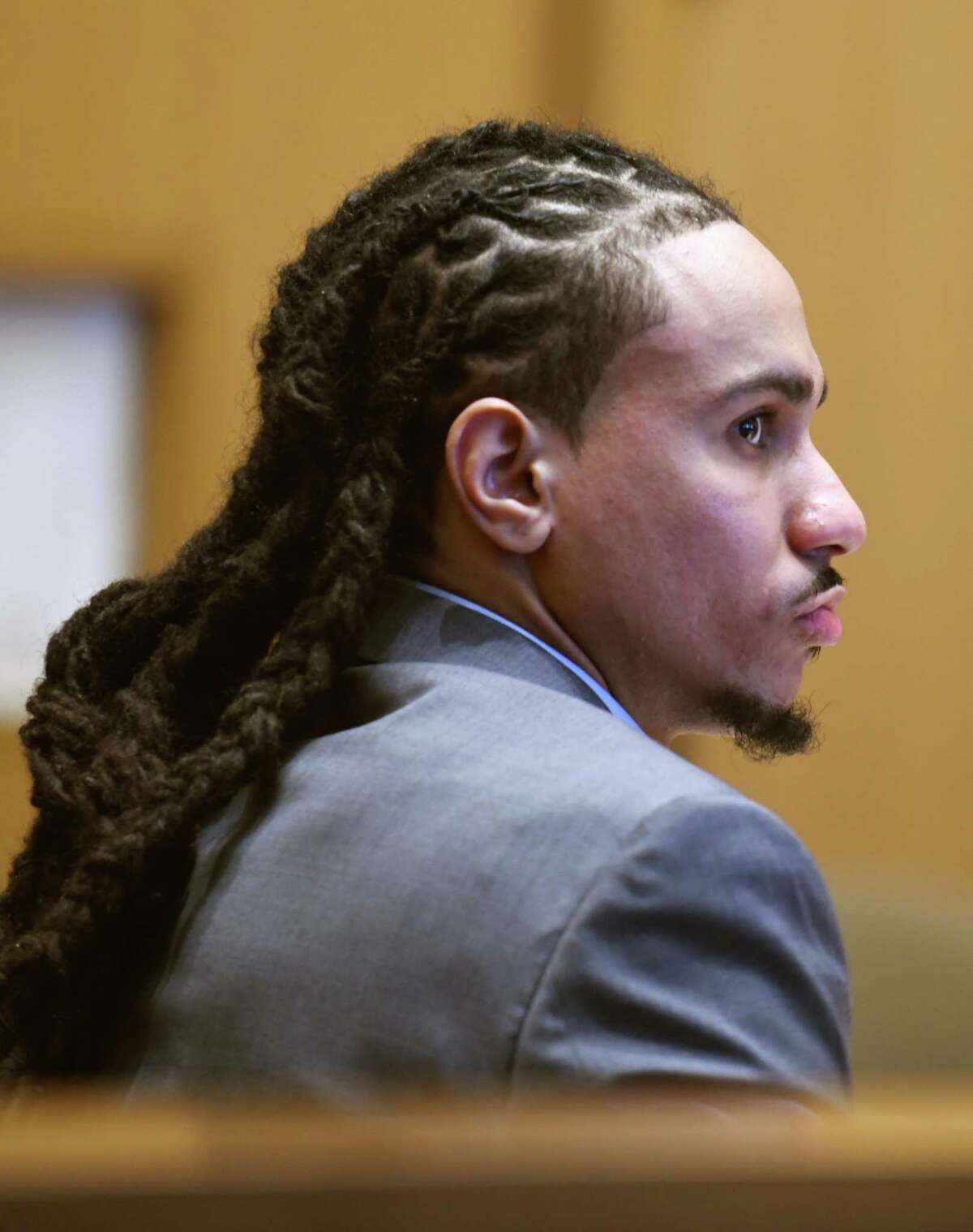 Jhonel Telemin-Valerio attends the first day of trial in a joint murder case at Connecticut Superior Court in Stamford, Conn. Monday, Nov. 1, 2021. Trial began Monday for Deshawn Hayes and Jhonel Telemin-Valerio, who are accused of fatally shooting Maxine Gooden, a 43-year-old mother of five, in 2015.