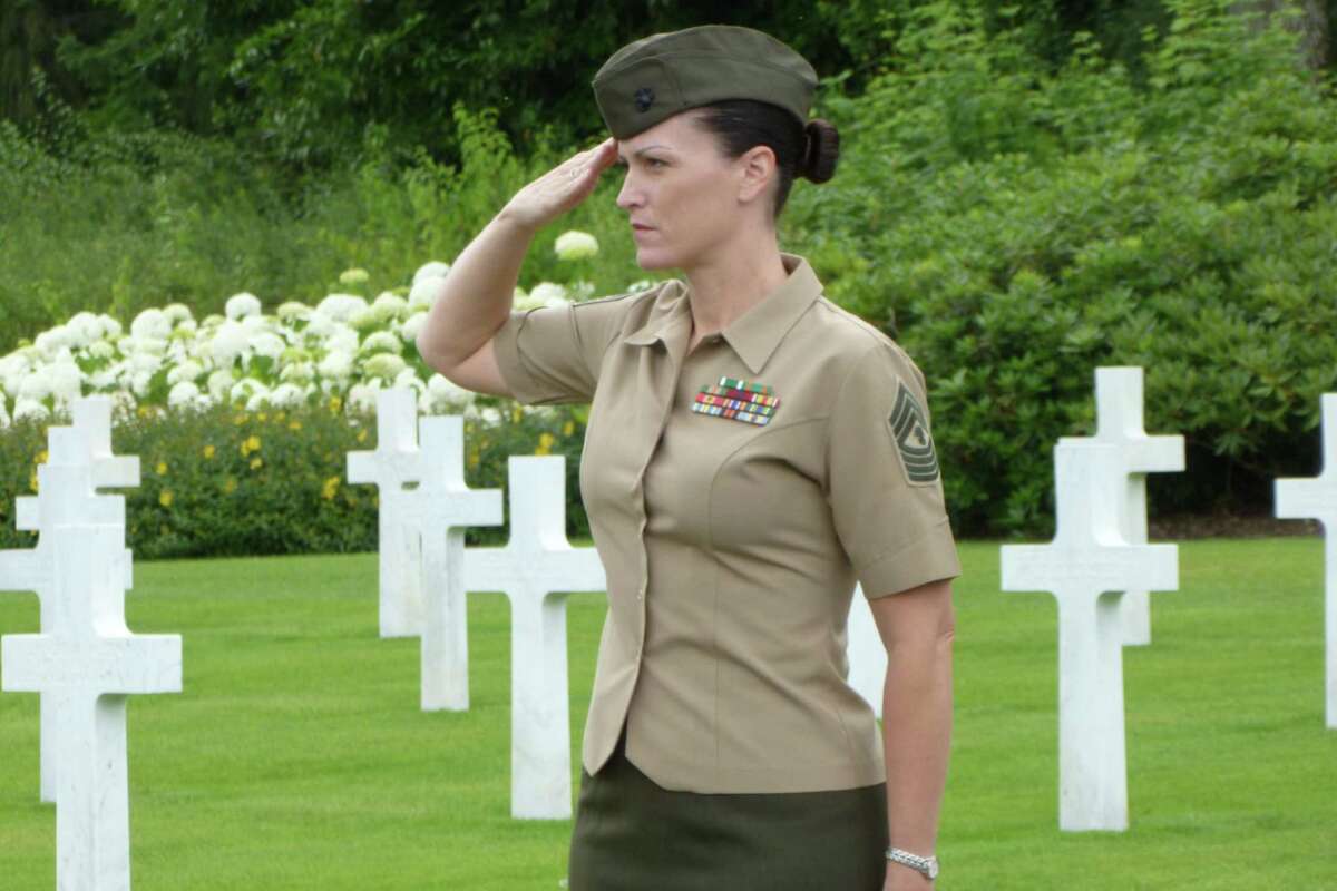 Brodersen stands at attention and salutes while visiting Belleau Wood at the American military cemetery in Aisne-Marne, France where Marines were given the nickname, "Teufelhunden" by the Germans during WWI. It's translated as "Devil Dogs."