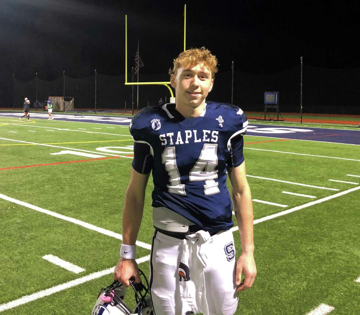 Staples quarterback Ryan Thompson after a 26-10 win over Ridgefield on Friday, Nov. 12, 2021 in Westport, Conn.