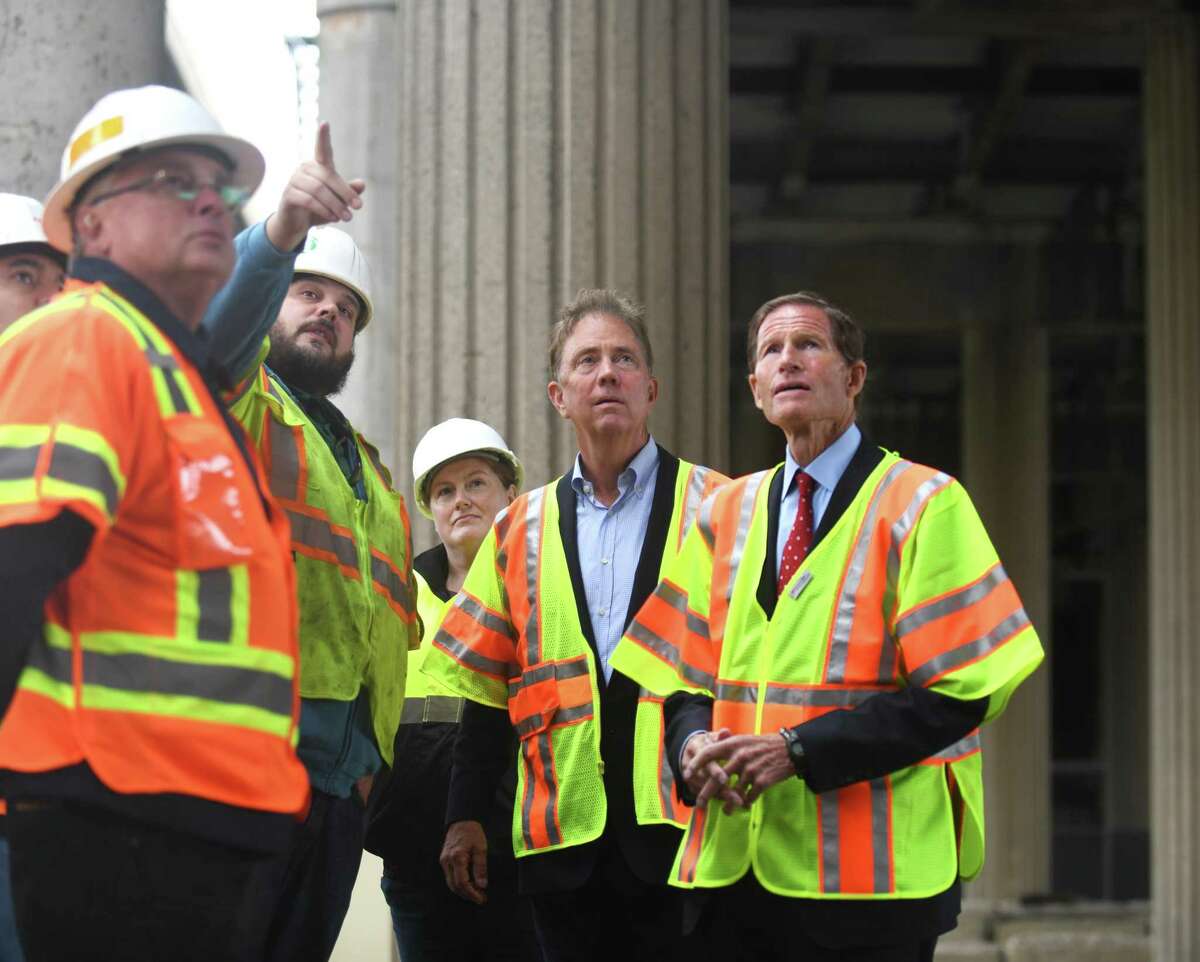U.S. Sen. Richard Blumenthal, D-Conn., far right, and Connecticut Gov. Ned Lamont, second from right, meet with crews to survey damage to an I-95 overpass and speak about infrastructure in Stamford last month.