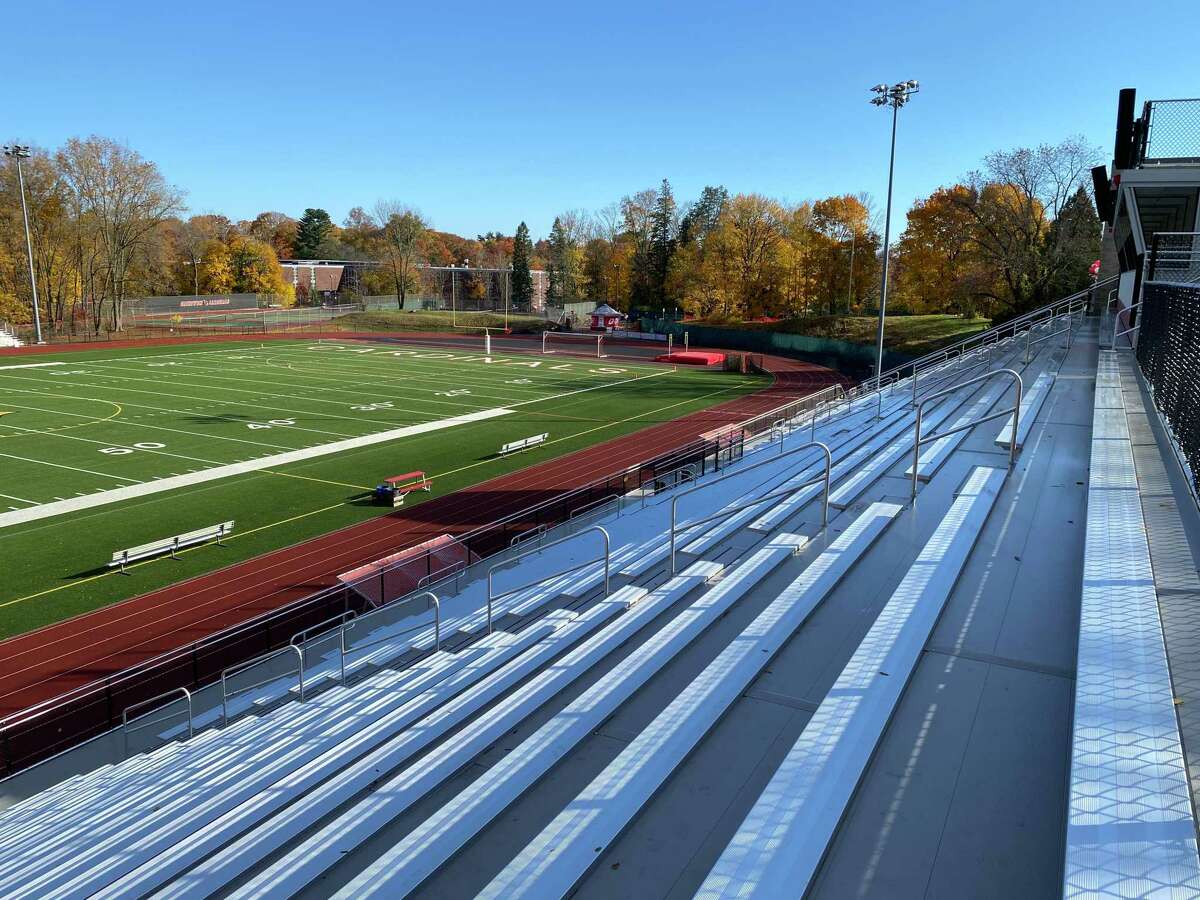 Greenwich High School celebrates the official grand reopening of Cardinal Stadium Saturday, Nov. 13, 2021, with its new bleachers, before its football game against Stamford High.