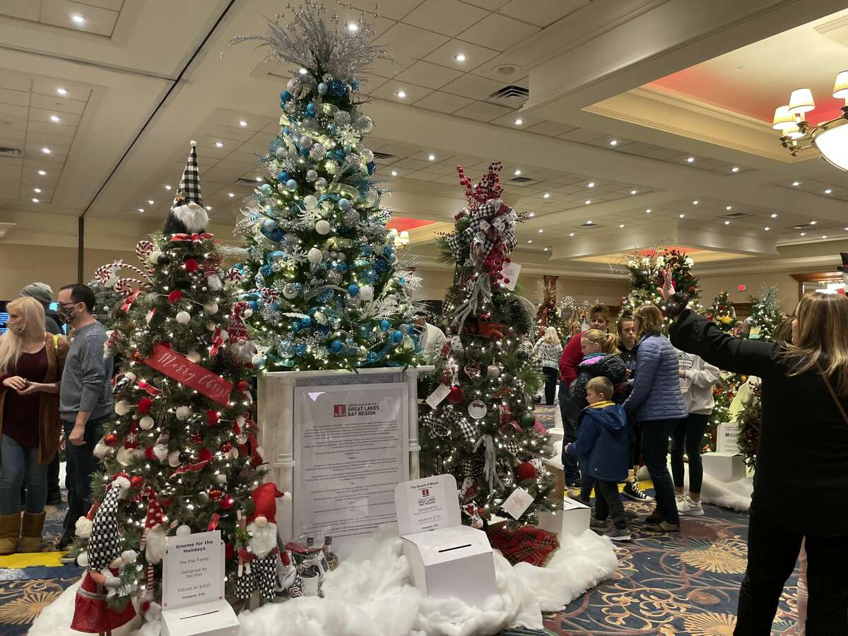Christmas trees light up the banquet room for the Festival of Trees three-day annual event on Saturday, Nov. 13, 2021 at the Great Hall Banquet & Convention Center in Midland. 