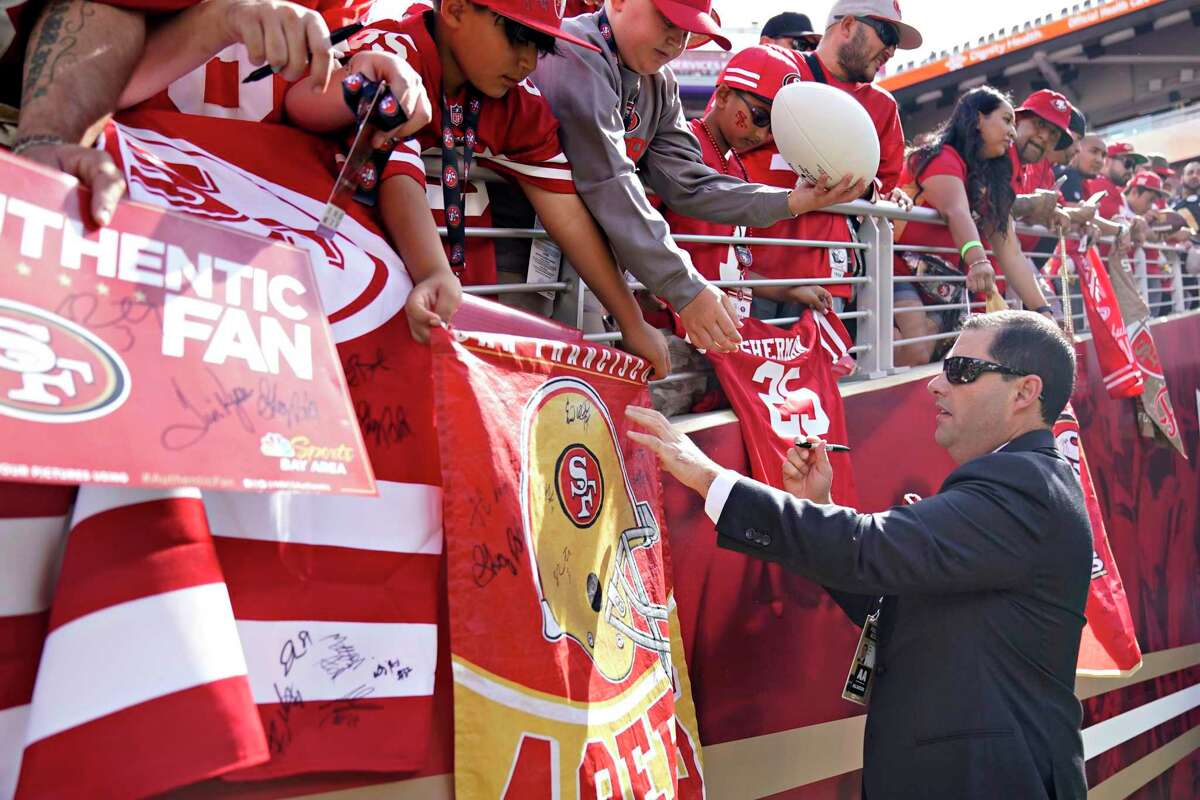 San Francisco 49ers owner Jed York signs autographs before an NFL football game between the 49ers and the Pittsburgh Steelers in Santa Clara, Calif., Sunday, Sept. 22, 2019. (AP Photo/Tony Avelar)