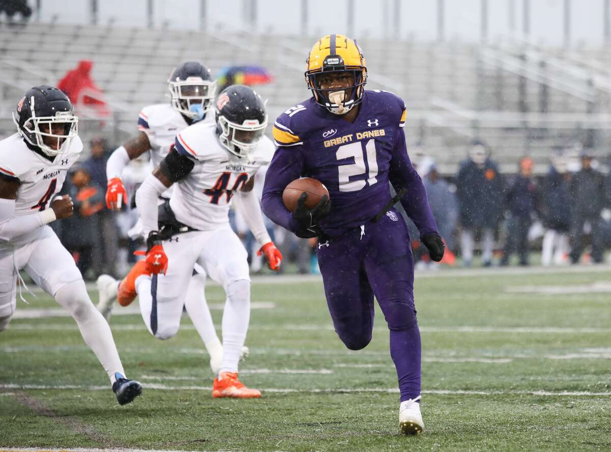 Senior Karl Mofor of UAlbany picks up yardage in the final home game of his career Saturday against Morgan State. Mofor rushed for 90 yards and three touchdowns.