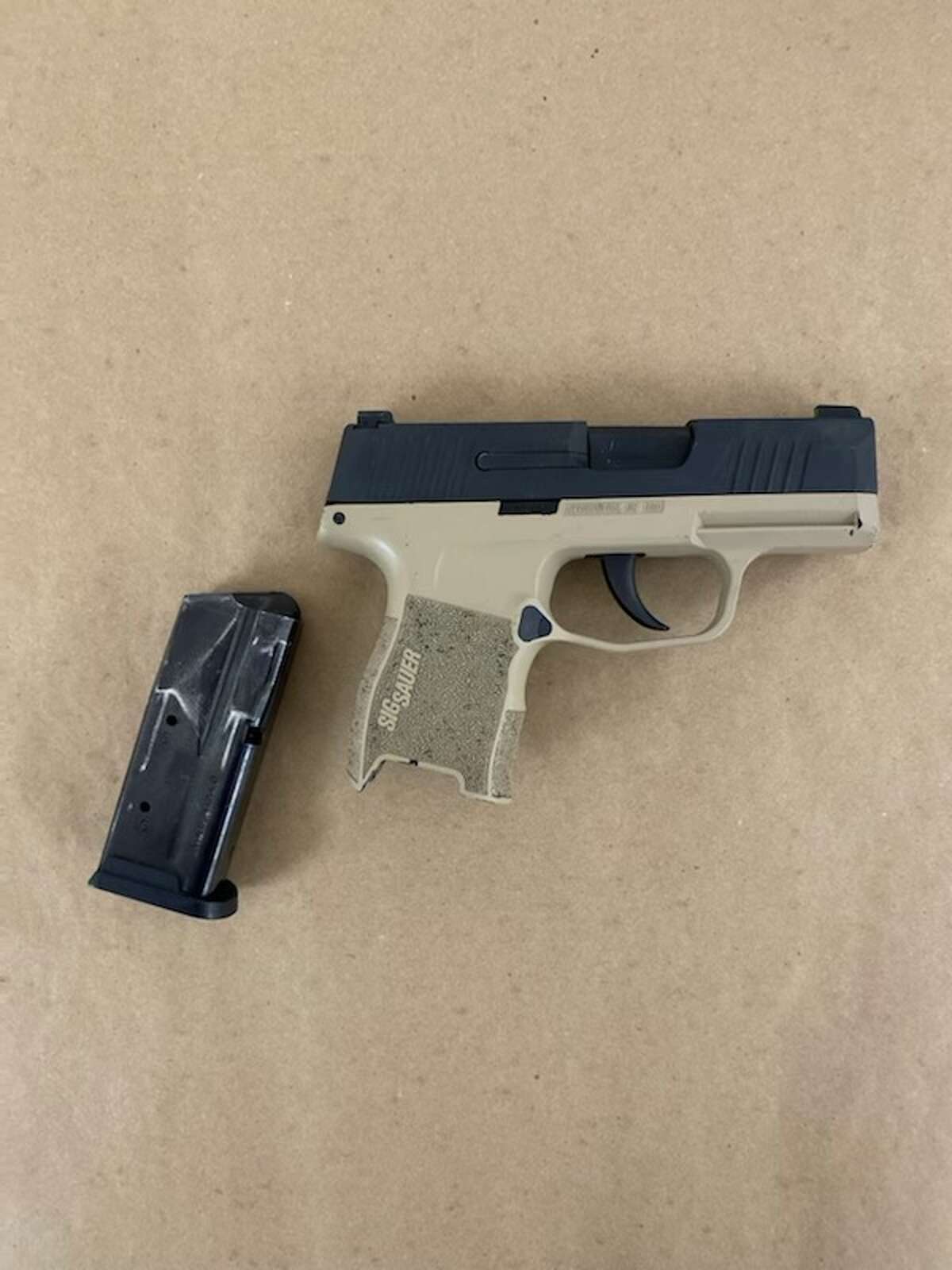 City officers said they recovered two loaded handguns from a Troy 18-year-old. 