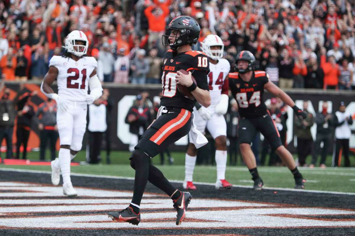 Oregon State quarterback Chance Nolan (10) runs into the end zone for a touchdown against Stanford during the first half of an NCAA college football game Saturday, Nov. 13, 2021, in Corvallis, Ore. (AP Photo/Amanda Loman)