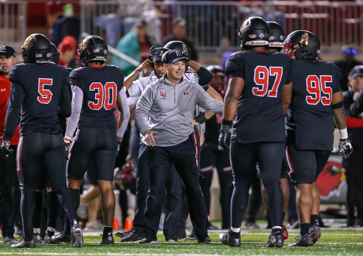 Lamar Head Coach Blane Morgan congratulates his team as they come off the field Saturday at the Provost Umphrey Stadium in Beaumont, TX. Photo taken November 13, 2021 by Jarrod Brown