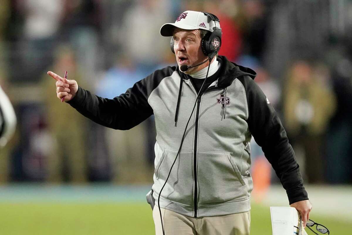 Texas A&M coach Jimbo Fisher reacts to an official's call during the second half of the team's NCAA college football game against Mississippi, Saturday, Nov. 13, 2021, in Oxford, Miss. (AP Photo/Rogelio V. Solis)