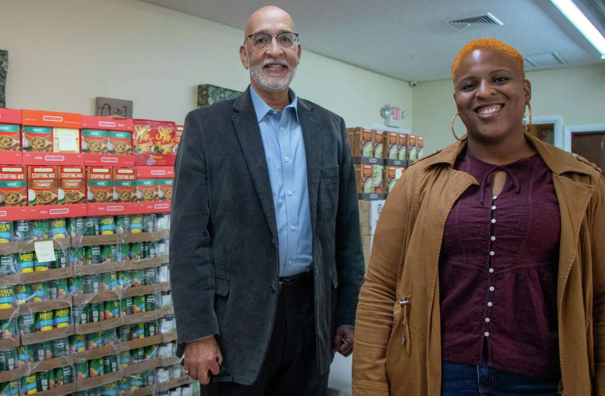 Rev.  Todd Foster (left), Storehouse Project executive director, and Kimani Sioux Williams, Storehouse Project operations manager, are getting ready to provide Thanksgiving baskets to families in Milford. Foster's goal is to giveaway 1,000 Thanksgiving Turkey baskets.