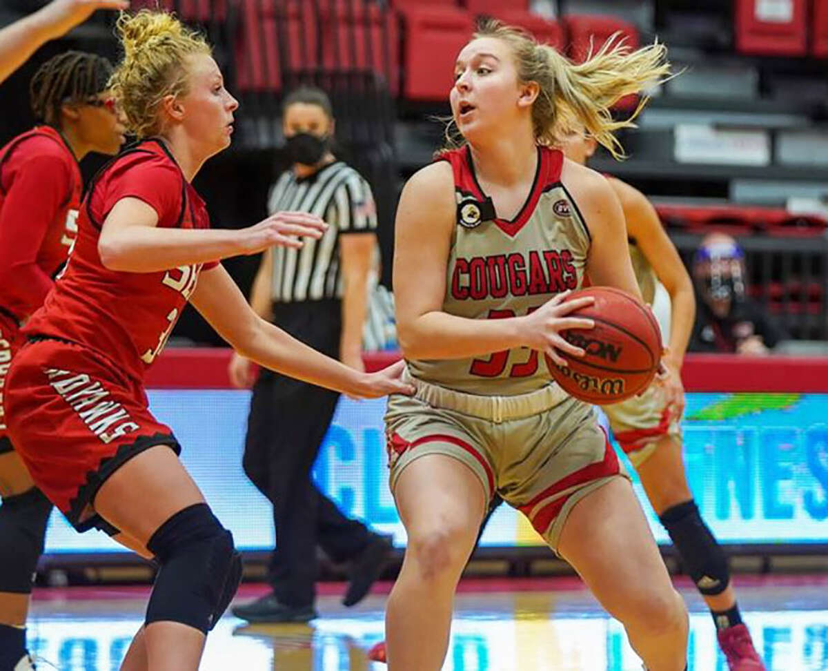 SIUE's Caite Knutson (right) provided a spark off the bench, but the Cougars lost Sunday at Memphis.