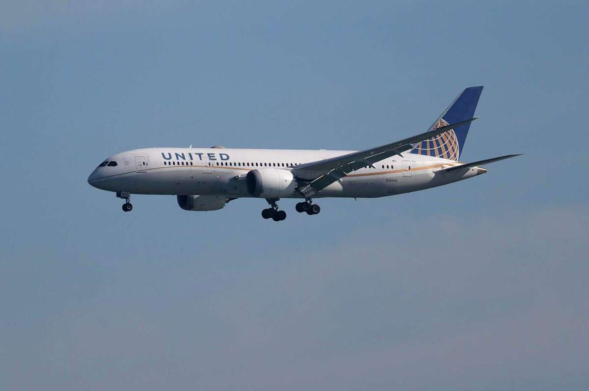 A United Airlines 787 Dreamliner prepares to land at San Francisco International Airport. A passenger on a different United flight is accused of assaulting a flight attendant after the attendant told the passenger’s husband to put his face mask on.