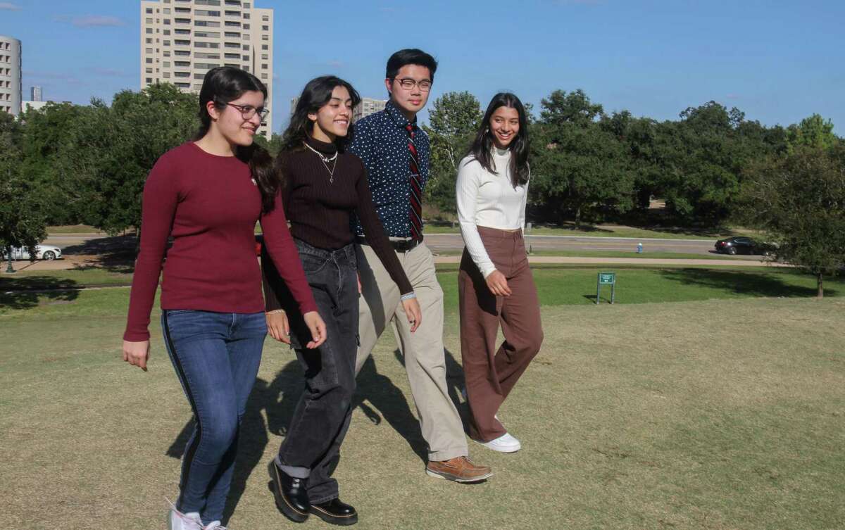 Anika Shethia, from left, Gargi Rakhade, Tommy Wan, and Julia Lewis, are students involved in Houston Youth Climate Strike and the city's climate action plan. They say the city hasn't done enough to get things moving toward the goal of being carbon neutral by 2050.They were near Miller Outdoor Theatre in Houston on November 14, 2021.