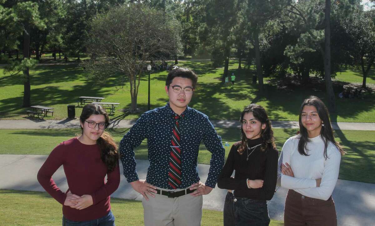 Anika Shethia, from left, Tommy Wan, Gargi Rakhade and Julia Lewis, are students involved in Houston Youth Climate Strike and the city's climate action plan. They say the city hasn't done enough to get things moving toward the goal of being carbon neutral by 2050.They were near Miller Outdoor Theatre in Houston on November 14, 2021.