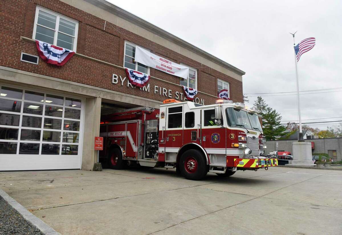 Firefighters respond to a call at the renovated Byram Volunteer Fire Department in the Byram section of Greenwich, Conn., on Nov. 15, 2021. The nearly 70-year-old building retained its classic appearance, but was benefited by $3 million in upgrades.