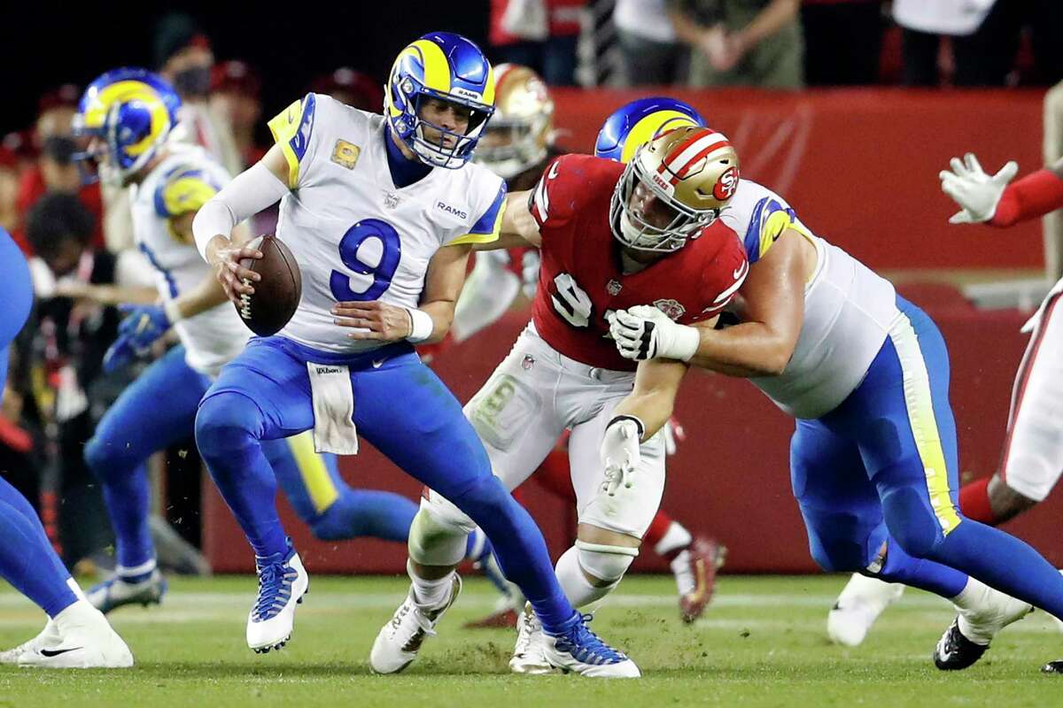 San Francisco 49ers' Nick Bosa sacks Los Angeles Rams' Matthew Stafford in 4th quarter during Niners' 31-10 win in NFL game at Levi's Stadium in Santa Clara, Calif., on Monday, November 15, 2021.
