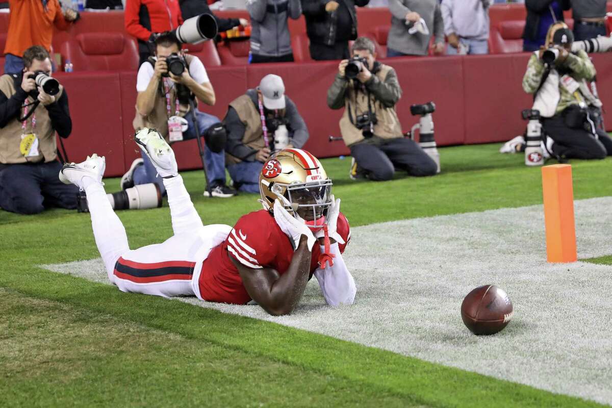 San Francisco 49ers' Deebo Samuel celebrates his 8-yard touchdown run in 2nd quarter against Los Angeles Rams during NFL game at Levi's Stadium in Santa Clara, Calif., on Monday, November 15, 2021.