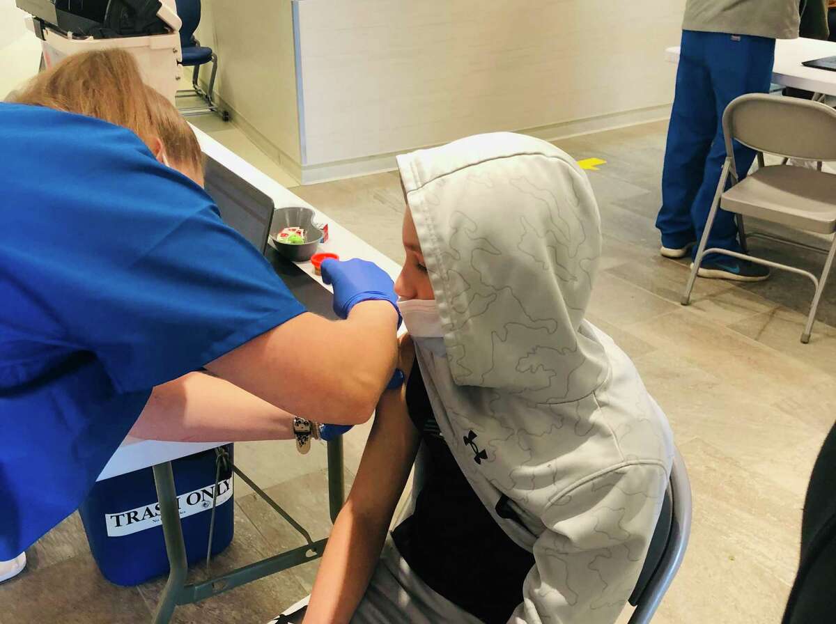 Eleven-year-old Ryan Sarno receives his first COVID-19 vaccine dose of two at New Lebanon School this past Sunday, Nov. 14, 2021. He was one of more than 340 students ages 5 to 11 who received vaccines last weekend at one of the two clinics held in schools in Greenwich