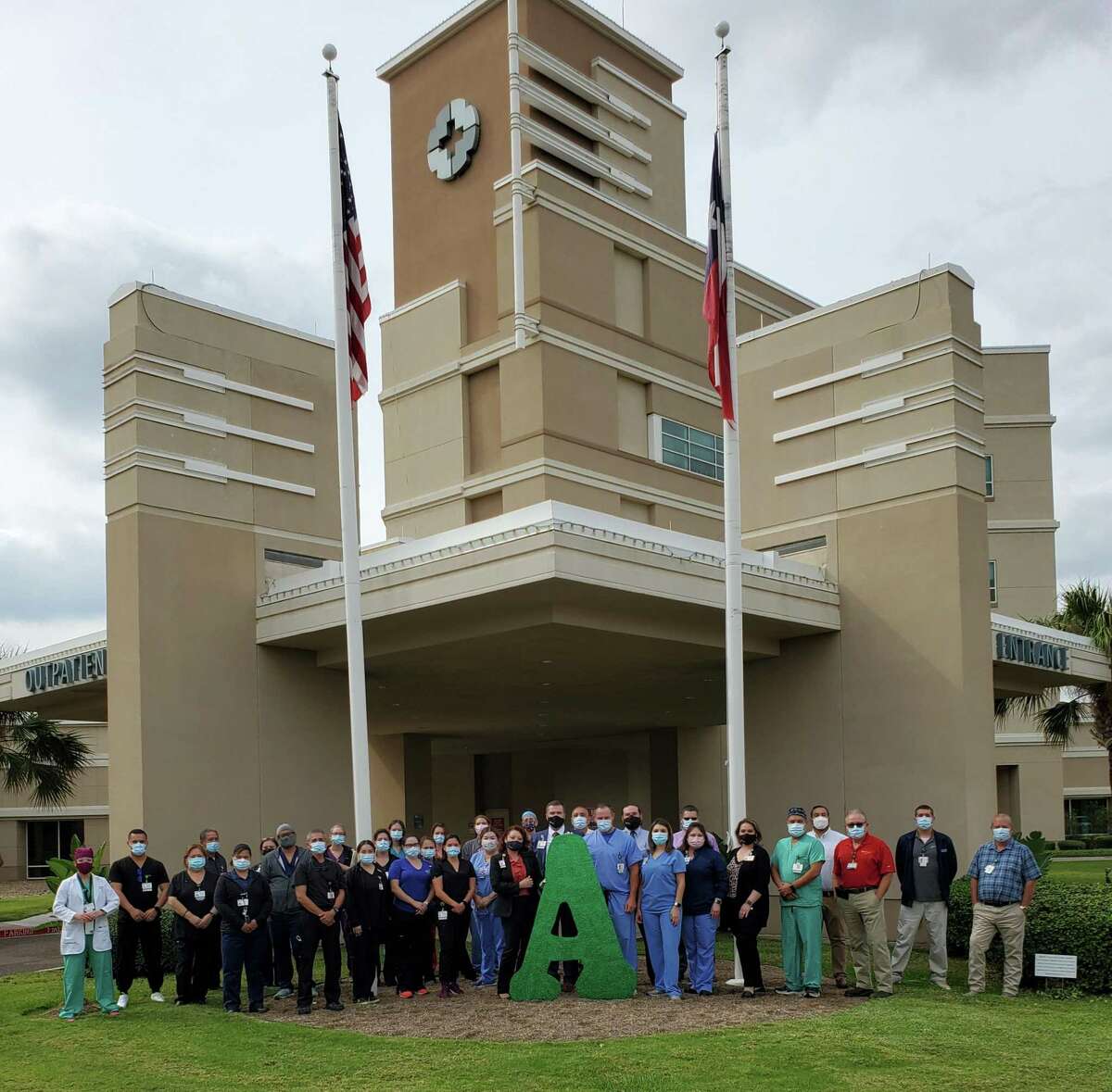 Doctors Hospital employees celebrate outside the facility their “A” Leapfrog Hospital Safety Grade.