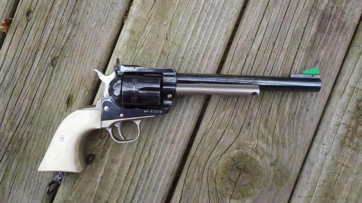Tom's Ruger Black Hawk revolver in .45 Colt, customized into aMag-Na-Port "Predator" featuring quick to use and accurate "peep-sights" and custom caribou antler grips, has accounted for a number of whitetails.