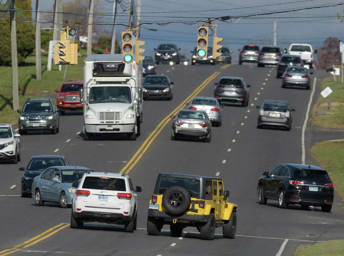 Traffic at the intersection of Route 202 and the Shop Rite Plaza on Tuesday afternoon. Brookfield begins a new road improvement project this week that will include left-turn lanes from both directions at the intersection. November 16, 2021, Brookfield, Conn.
