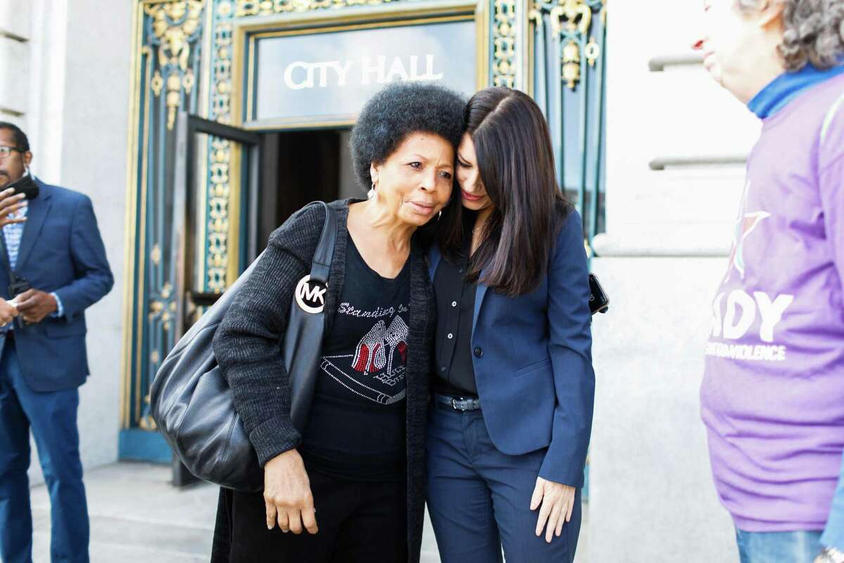 S.F. Supervisor Catherine Stefani (right) embraces advocate Maddie Scott before introducing a ballot initiative to create an office of support for crime victims.