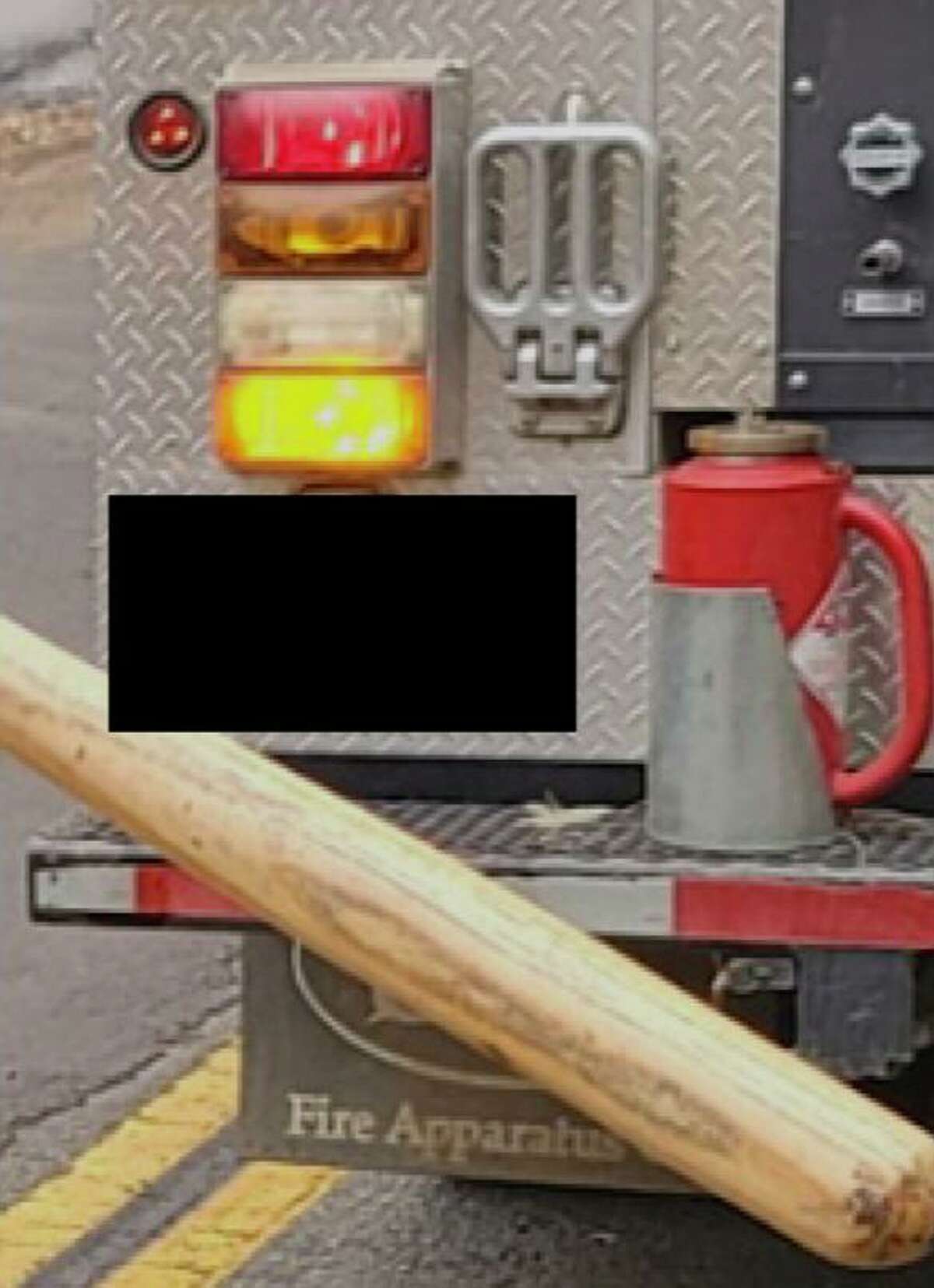 A drip torch on the bumper of a Bella Wildfire & Forestry fire truck. Cal Fire redacted the photo, which was part of its investigation into an illegal backfire, to obscure the license plate.