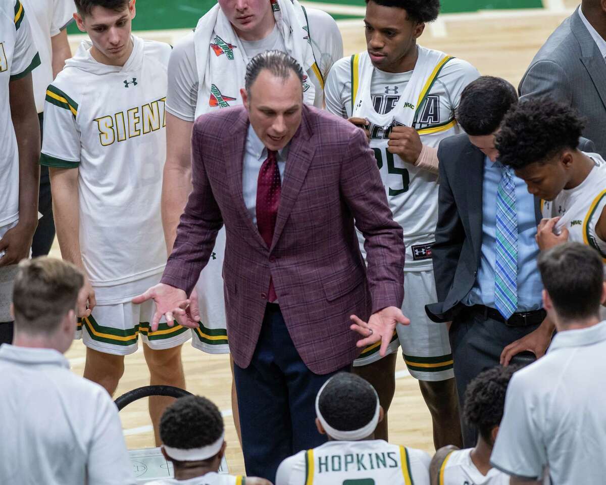 Siena coach Carm Maciariello talks to his team during their most recent game against Yale at Times Union Center on Tuesday, Nov. 16, 2021. The Saints lost 82-54.