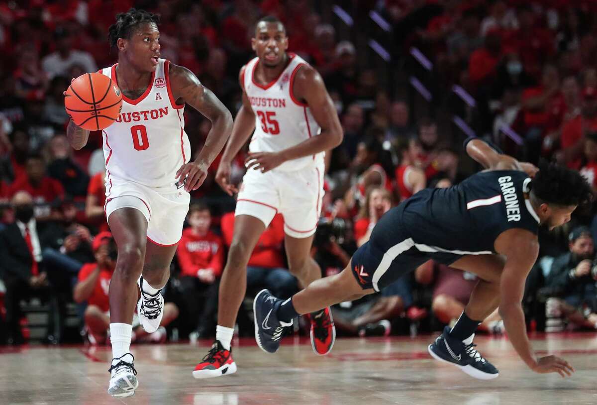 Houston guard Marcus Sasser, against Virginia last season, Sasser, opted to return for his final season rather than remain in the NBA draft. He is the first UH men's basketball player selected to the AP preseason team since it began in 1986-87.
