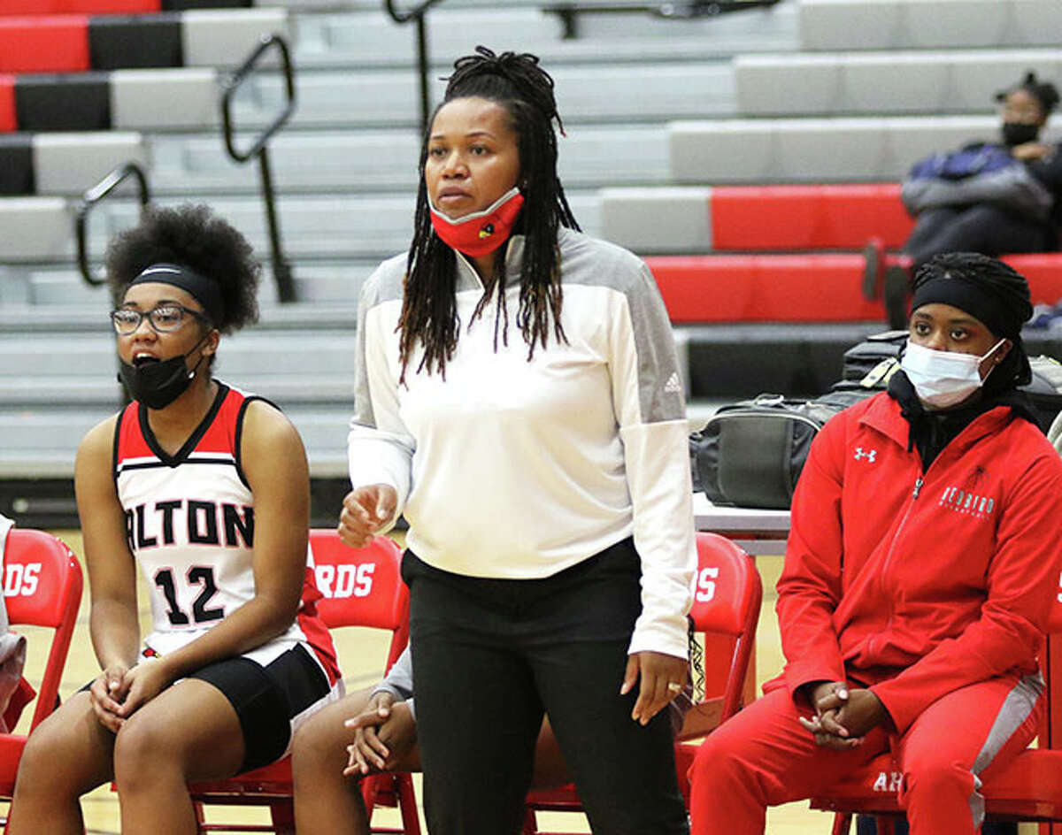 Alton High girls basketball coach coach Deserea Howard's team dropped a 66-44 decision to Edwardsville Thursday night in its Southwestern Conference opener. Howard is shown during a recent Alton tournament game against Jersey.