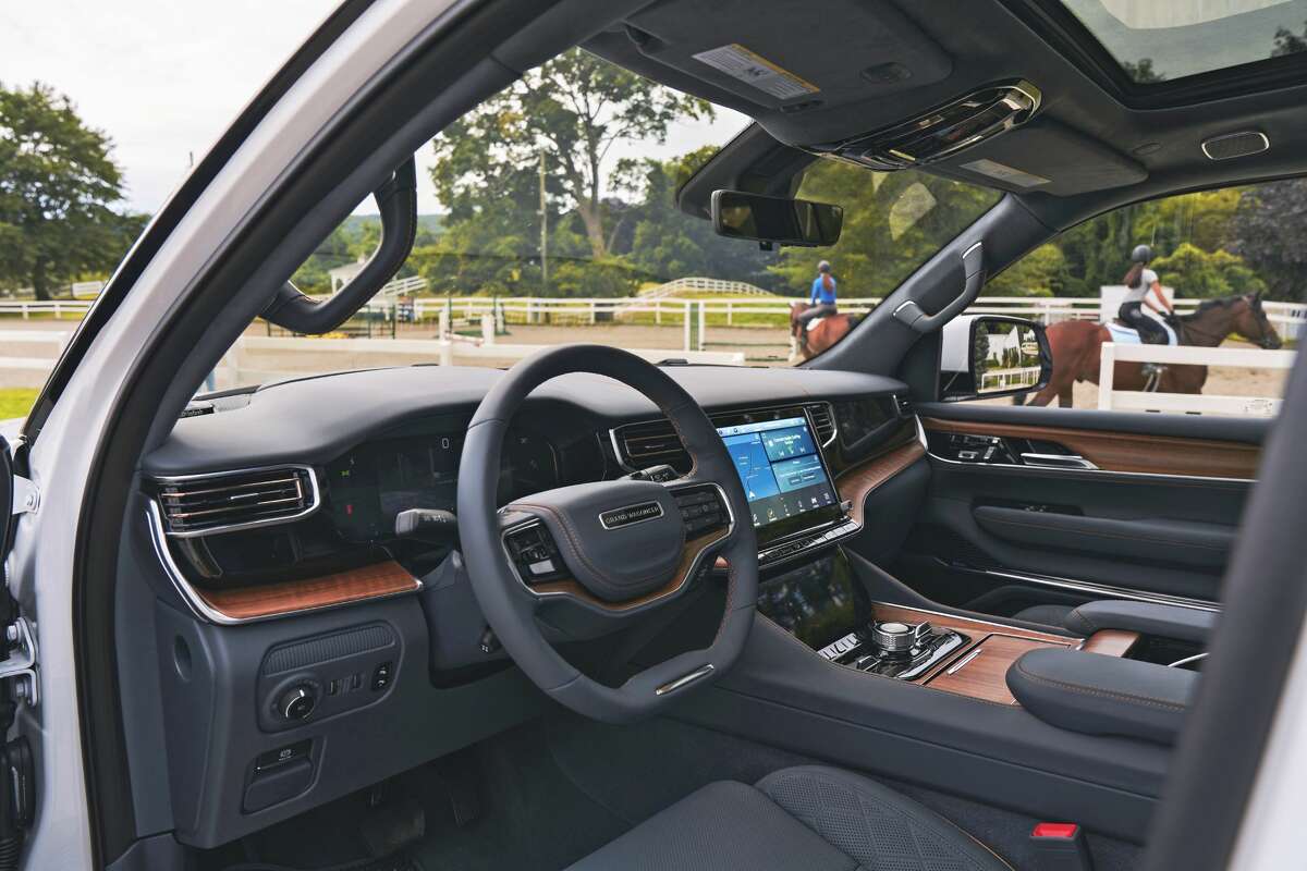 The 2022 Grand Wagoneer has country   for up   to 7  radical   with the modular  middle-row brace  of captain's chairs, oregon  8  passengers with the optional middle-row seat  seat.