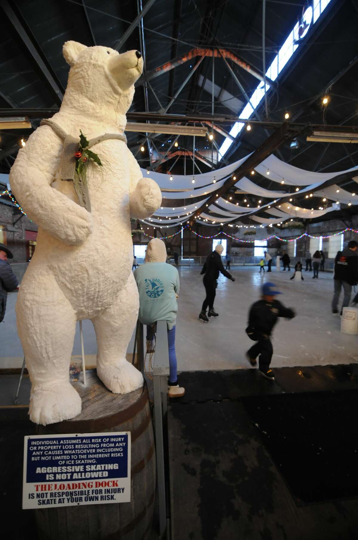 A polar bear greets visitors to The Loading Dock's ice rink in 2019 in this file photo. The Grafton rink will reopen for the season on Saturday.