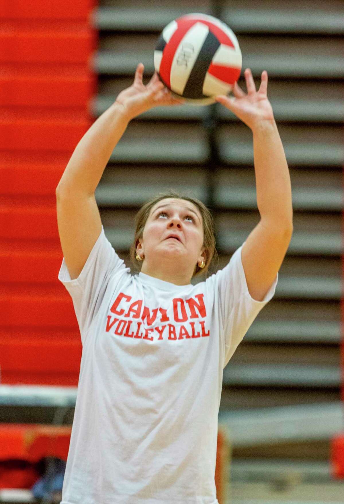 New Braunfels Canyon?•s Megan Hawkins, sets the ball Tuesday, Nov. 16, 2021 during the team?•s practice at Canyon High School in preparation for their state tournament appearance.